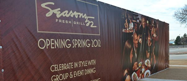 Custom printed promotional banner with bold graphics