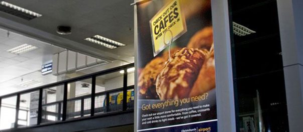 Full-colour vinyl banner hung on a building exterior