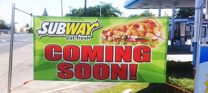 Restaurant promotional banner with full-colour food graphics