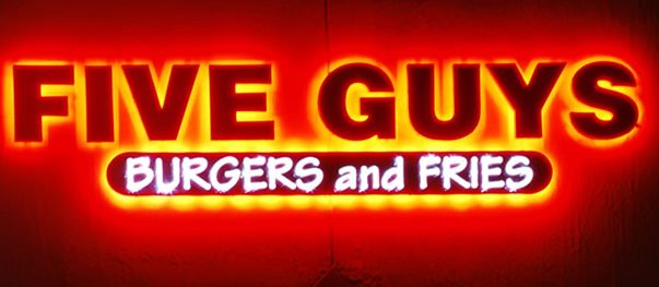 Close view of individually lit channel letters on a facade