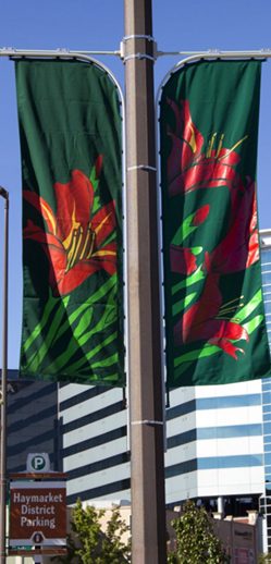 Printed promotional flag on a portable pole base