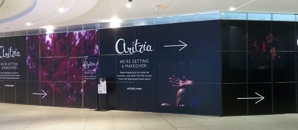 Full-colour hoarding panels wrapping a renovation site