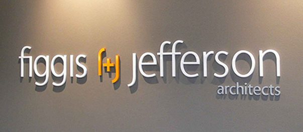 Dimensional logo sign on an office reception wall