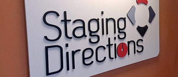 Layered acrylic reception sign with standoff mounts