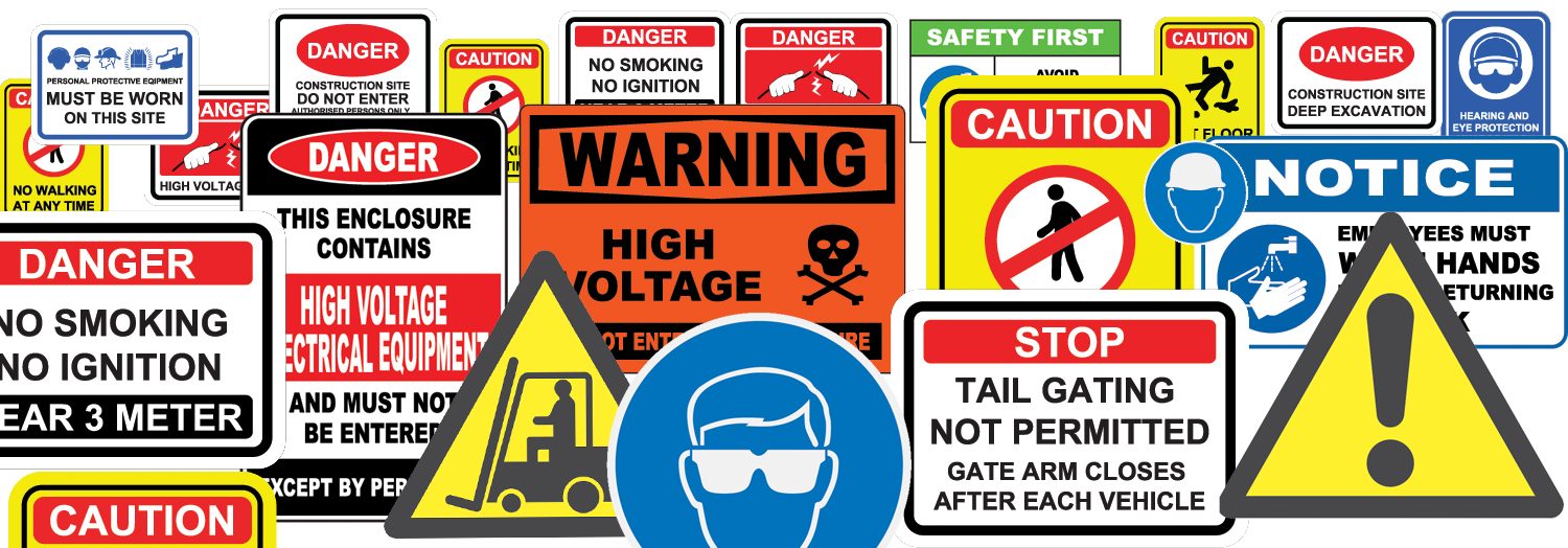 Assortment of warning, caution, parking and hazard signs with rolls of safety labels and pipe marker tape