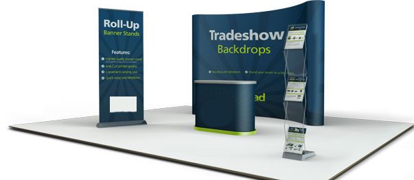 Blue trade show backdrop with printed graphics and display counter