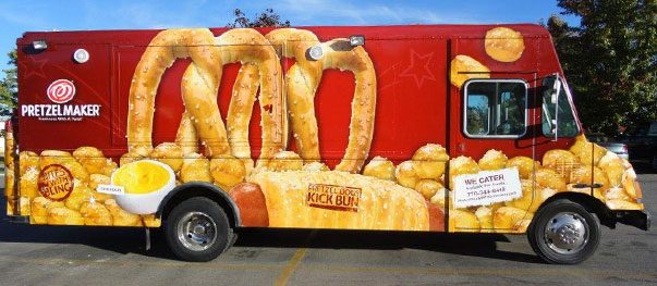 Delivery truck with branded wrap graphics