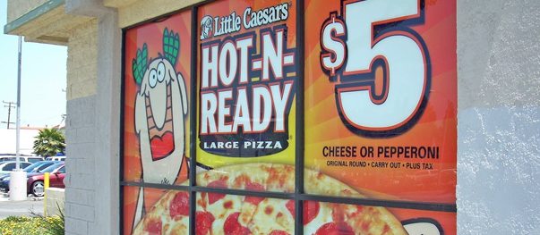 Full-colour graphics applied across a storefront window